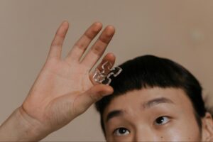 Girl Checking on a transparent thing